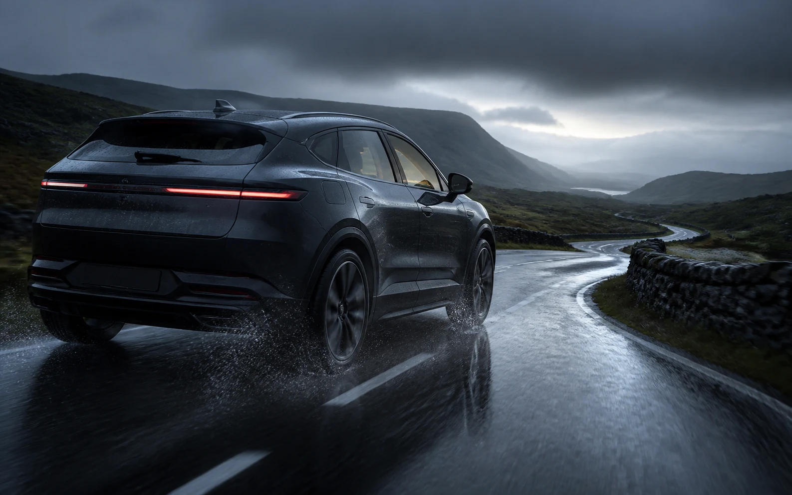 Connected luxury vehicle moving through a dramatic British landscape